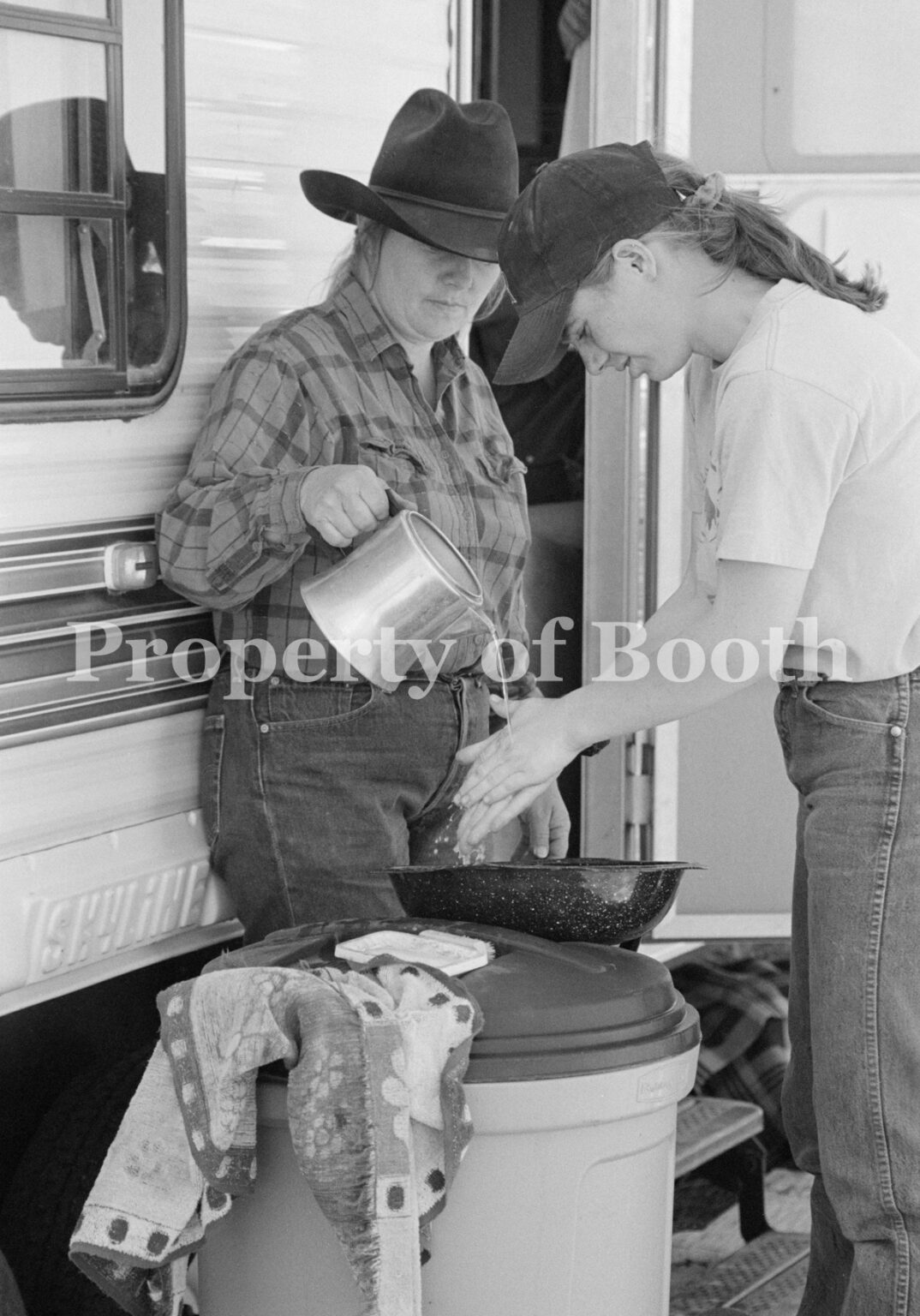 © Barbara Van Cleve, Mother Helps KaDee Wash Up [Chew Ranch, Utah], 2000, Pigment Print, 20" x 13.5", PH2018.007.003, Museum Purchase