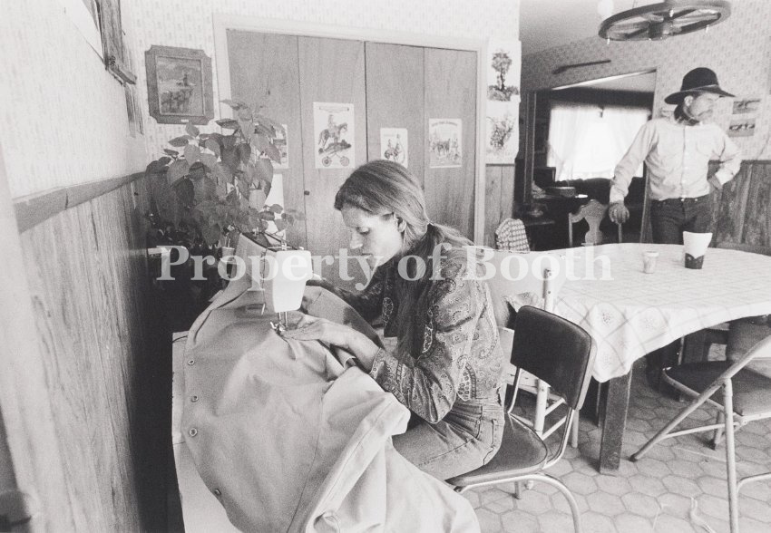 © Barbara Van Cleve, Tootie Mitchell Finishes Sewing, Husband Waits for Her Help, Stake Ranch, Elko, NV, 1986, Pigment Print, 13" x 19", PH2019.001.002, Museum Purchase