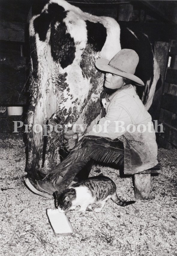 © Barbara Van Cleve, Melody Harding, Milking a Cow, Bar Cross Ranch, Old Piney, WY, 1987, Pigment Print, 18.8" x 13.1", PH2019.001.018, Museum Purchase