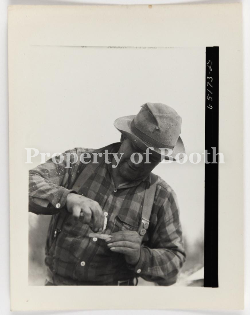 © John Vachon, Flathead Valley special area project, Montana. Farmer (Man Rolling Cigarette), 1942, Silver Gelatin Print , 3" x 4", PH2020.006.012, Museum Purchase