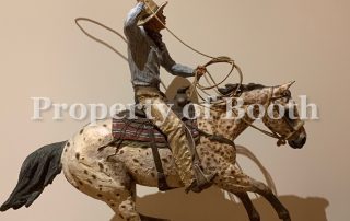 © Harry Jackson, Ropin' a Star, ca 1991, painted bronze, 25 x 23 x 9″, The Frank Harding Collection